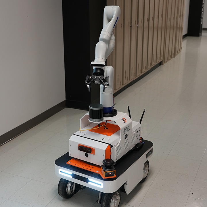 Robot with sensors and arm for mobile manipulation